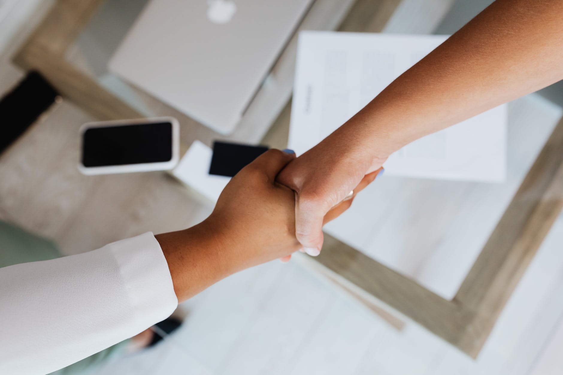 two people doing a handshake